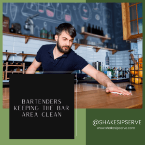 Bartenders Keeping The Bar Area Clean